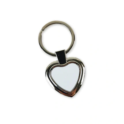 Llavero metálico sublimable modelo corazón borde grueso incluye caja