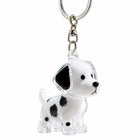 Llavero acrílico transparente con forma de perrito blanco y negro