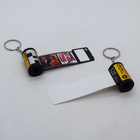 Llaveros con forma de rollo fotográfico, uno personalizado y otro en blanco